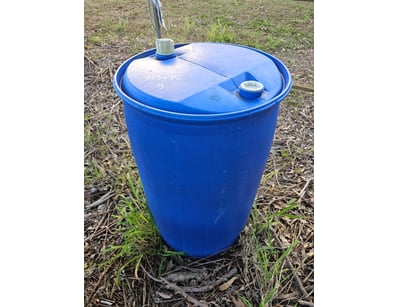 Plastic Barrels, quantity 2, and metal barrel

Loc...