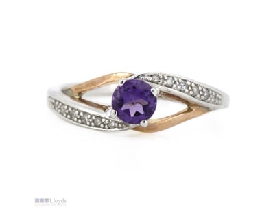 9K ROSE GOLD AND SILVER AMETHYST AND DIAMOND RING....