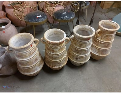 Collection of four vintage terracotta storage vess...