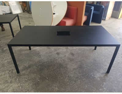 Modern black conference or dining table featuring ...