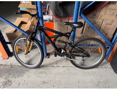 Mountain bike featuring robust steel frames in con...