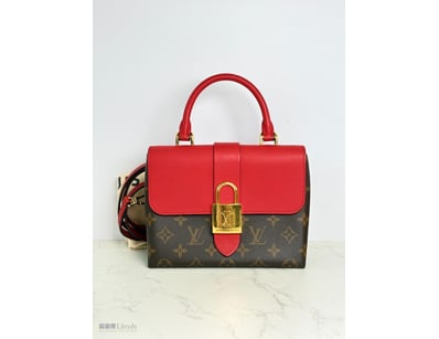 LOUIS VUITTON LOCK RED BAG

Material: Monogram C...