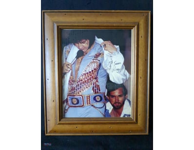 PHOTOGRAPH FEATURES ELVIS PRESLEY PERFORMING IN CO...