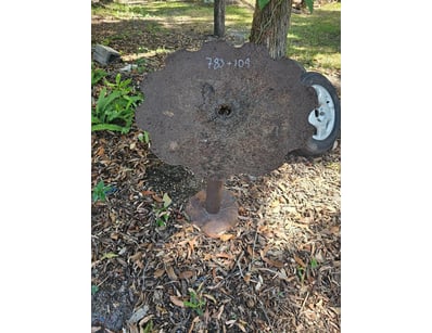 Repurposed Rustic Planter Stand from Plow Discs. 
...