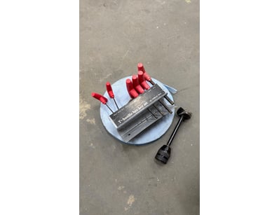 Assorted box of tools and accessories.

