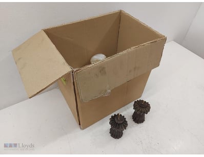 Lot comprising two decorative dark brown candles w...