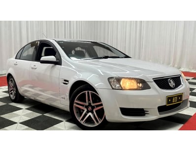 <b>2011 Holden Commodore Omega Sedan - White - 236...