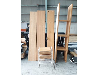 Tall wooden shelving unit featuring a modern minim...