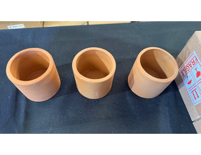 3 small terracotta pots


