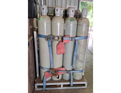 Ex Govt Gas bottle rack with 9 x empty gas bottes...