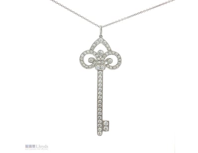 ELEGANT TIFFANY & CO. PLATINUM DIAMOND FLEUR DE LI...