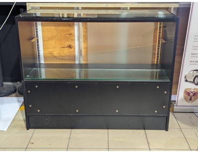 Glass fronted display cabinet with one glass shelf...