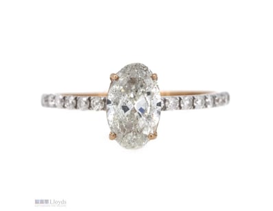 14K ROSE GOLD AND DIAMOND, CLASSIC RING.      

Th...