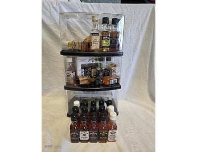 Jim Beam whiskey collection display featuring mult...