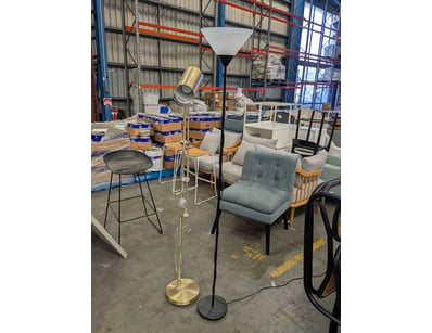 Modern floor lamp featuring a brass-finished pole ...
