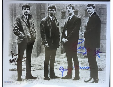 PHOTOGRAPH OF THE BEATLES, LIKELY A REPRODUCTION O...