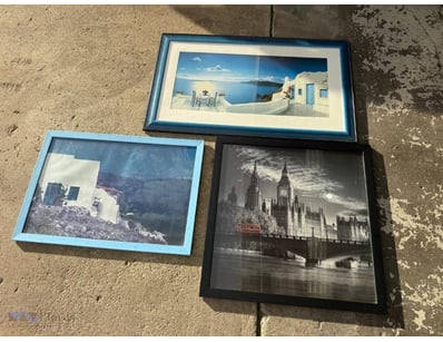 Lot of three framed prints featuring iconic travel...