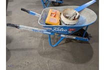 Blue steel wheelbarrow with pneumatic tire,