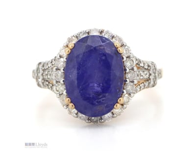 14K ROSE GOLD, TANZANITE AND DIAMOND, HALO RING.  ...