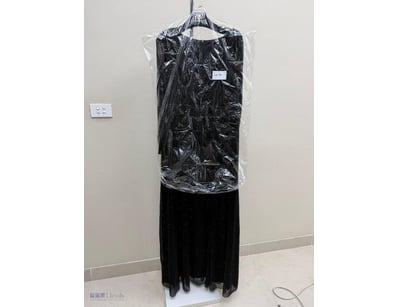 BLACK VELVET EVENING GOWN WITH SHEER OVERLAY

Item...