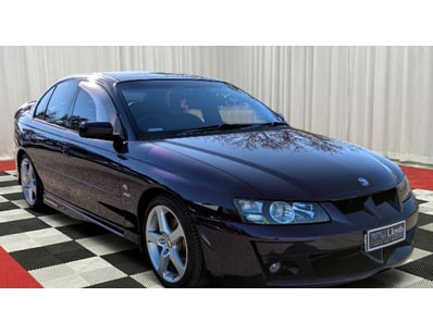 <b>2004 HSV VY Clubsport - Purple - 97,842km - 5.7...