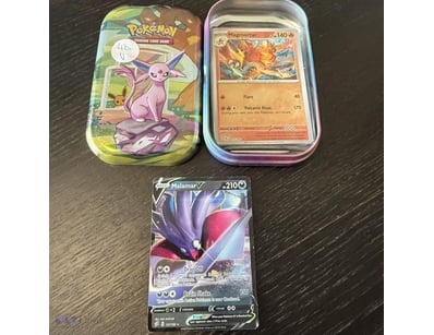 ASSORTED POKÉMON CARDS INCLUDING HOLOS, V & MORE. ...