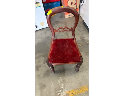 Elegant Victorian-era dining chair featuring a tim...