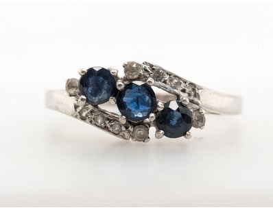 SILVER, SAPPHIRE AND CZ RING


583010+73


