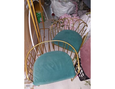 Pair of mid-century modern barrel-back chairs feat...