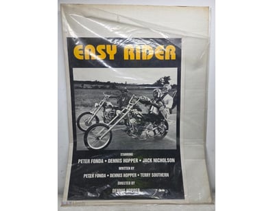 Vintage "Easy Rider" movie poster featuring iconic...