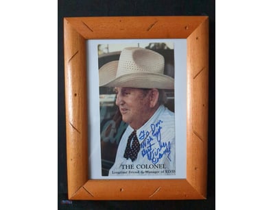 SIGNED PHOTOGRAPH OF "THE COLONEL" - ELVIS PRESLEY...