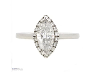 14K WHITE GOLD AND DIAMOND, HALO RING.      

The ...