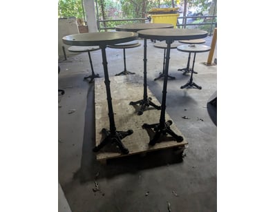 Set of  vintage cast iron pedestal tables featurin...