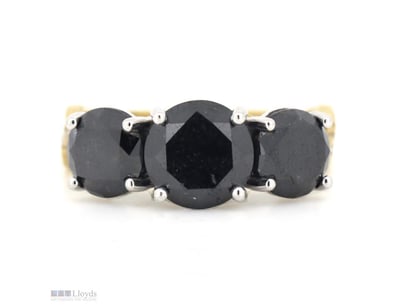 THE CENTRAL DESIGN FEATURES, 3 ROUND BRILLIANT CUT...