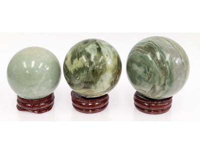 NATURAL GREEN SERPENTINE SPHERES WITH STANDS

Qu...