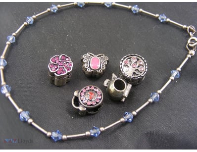 ANKLE BRACELET , CHARMS        

Condition: Good -...