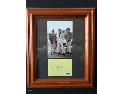 AUTOGRAPHED PHOTOGRAPH OF LARRY GELLER.

Item Size...