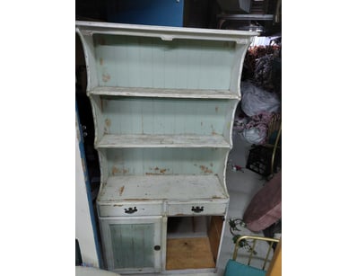 Vintage like  shabby chic cabinet featuring a dist...