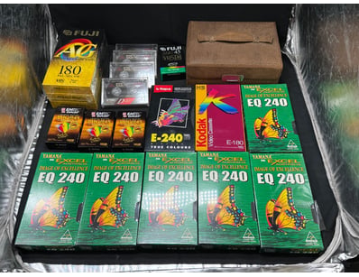 COLLECTION OF BLANK VHS TAPE AND CASSETTES AND LEA...