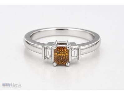 RADIANT CUT ORANGE DIAMOND TRILOGY RING WITH WHITE...