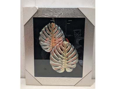 Striking framed art piece featuring two layered Mo...