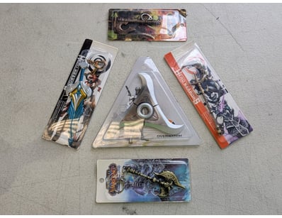 Collection of five licensed gaming merchandise key...