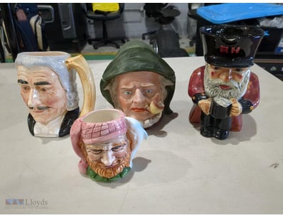 Lot of four vintage ceramic character jugs featuri...