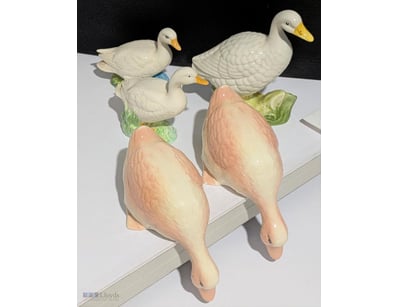 DUCK FIGURINES INCL TWO THAT SIT ON EDGE OF TABLE ...