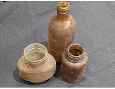 COLLECTION OF MEDICINAL GLASS BOTTLES AND VESSELS...