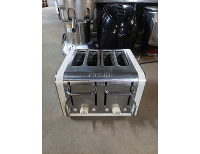 Commercial-grade Dualit 4-slot toaster featuring s...