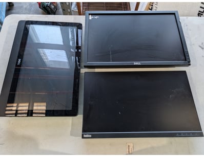 Lot of three computer monitors, various models.
...