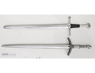 PAIR OF DECORATIVE LORD OF THE RING SWORDS

Item S...