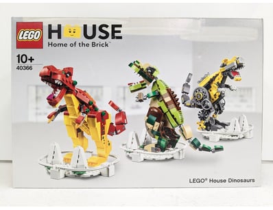 LEGO House Dinosaurs set 40366 featuring three bui...