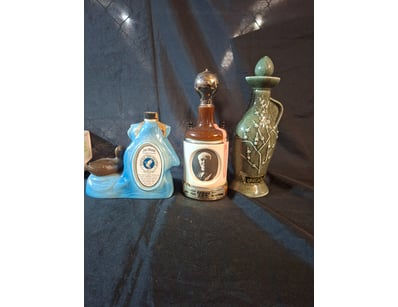 VINTAGE JIM BEAM CERAMIC DECANTERS - THREE-PIECE L...